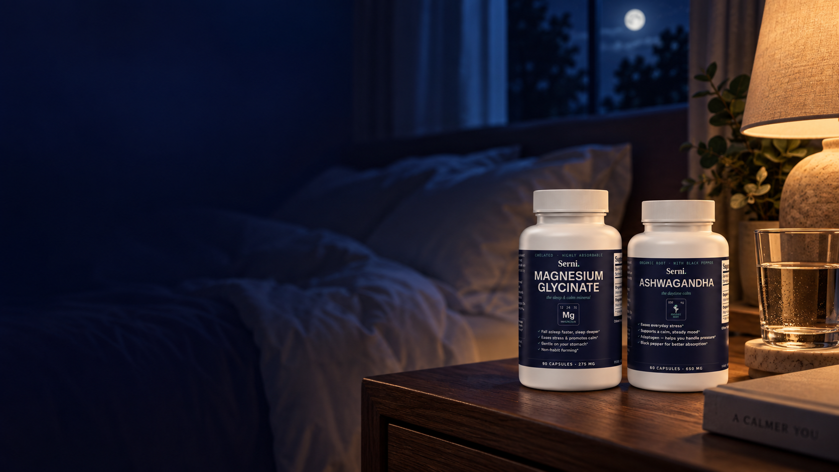 Serni Magnesium Glycinate and Ashwagandha bottles on a bedside nightstand with warm lamplight and moonlight through the window