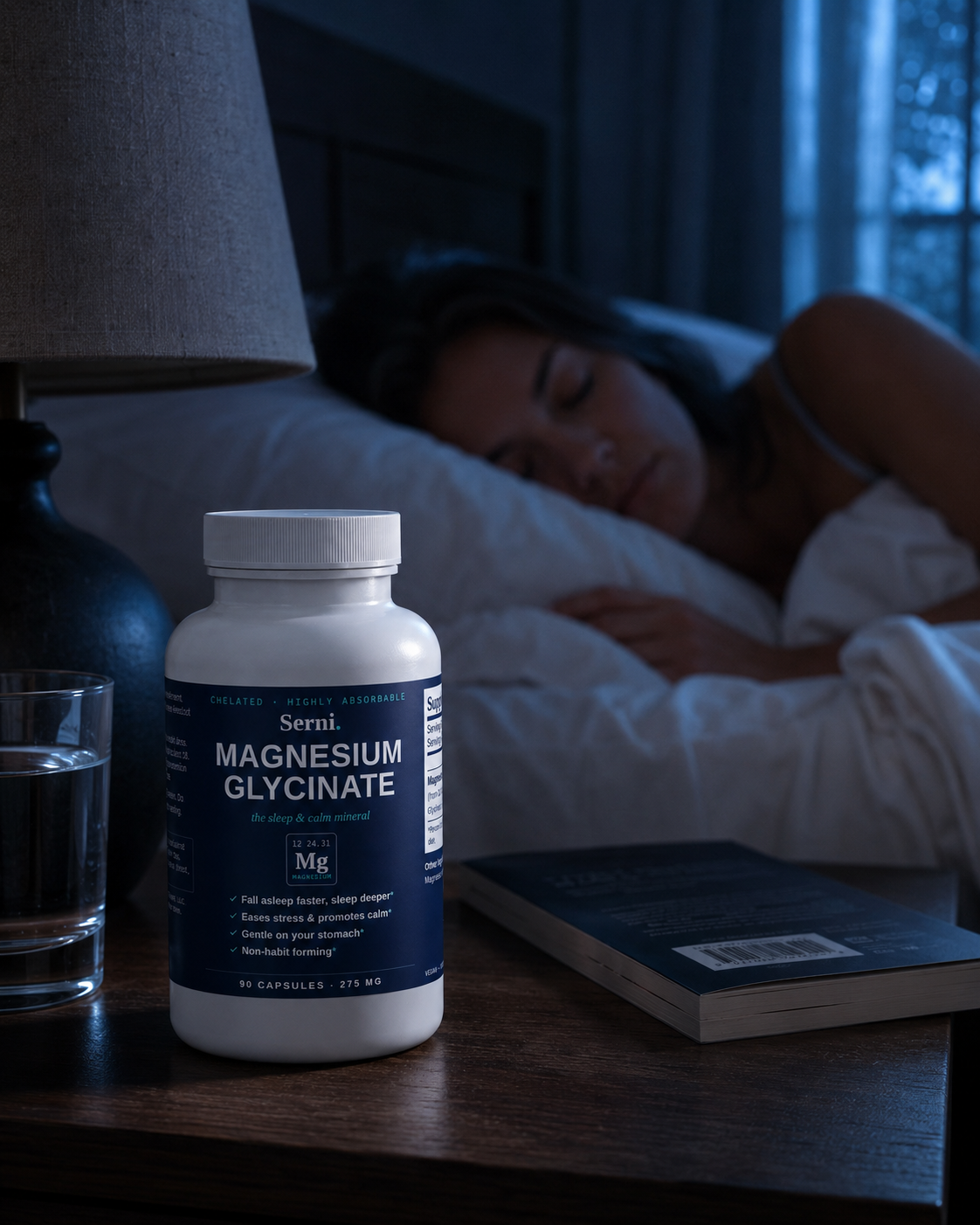Serni Magnesium Glycinate bottle for sleep on a dark nightstand beside a bed at night